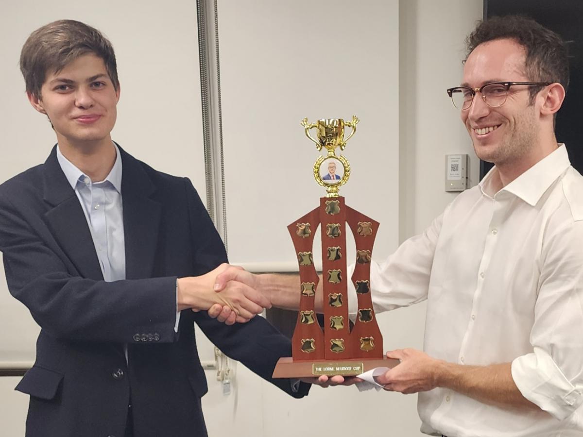 Ilya and Bruce holding trophy